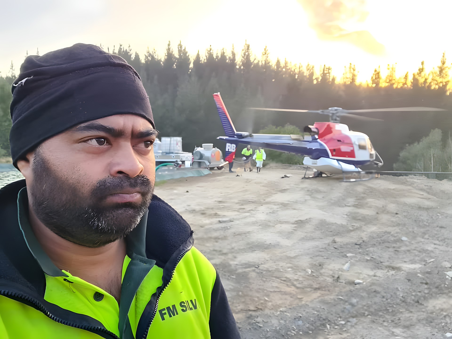 Crew member at a helicopter landing site